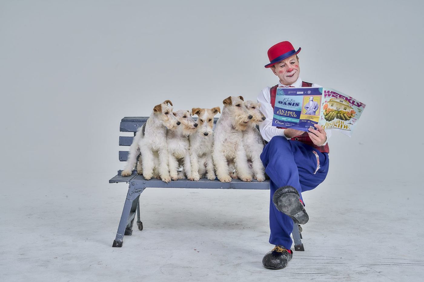 Gregory Popovich with his rescued fox terriers